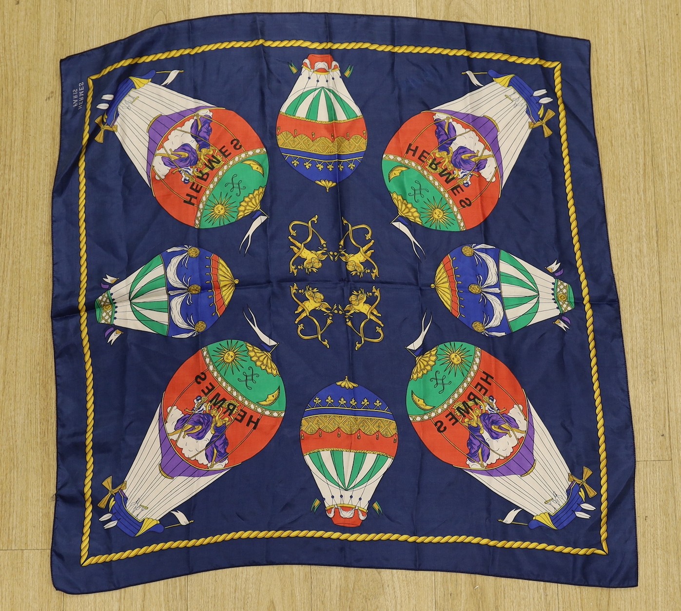 An Hermes Paris silk hot air balloon cherub scarf